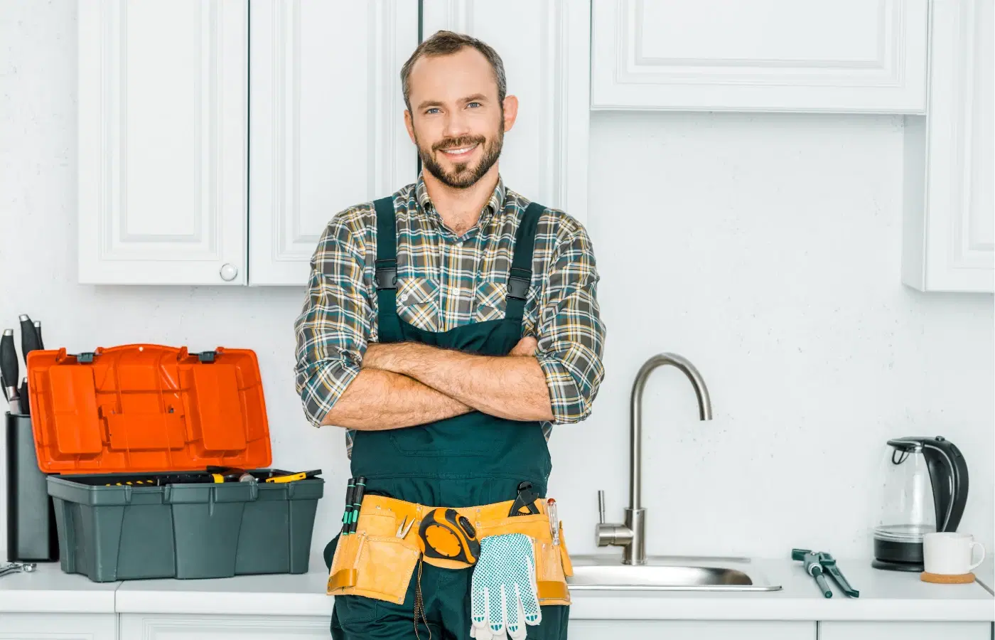 Plumber standing by sink