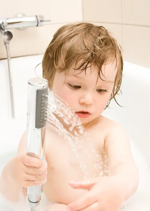 Boy taking a bath